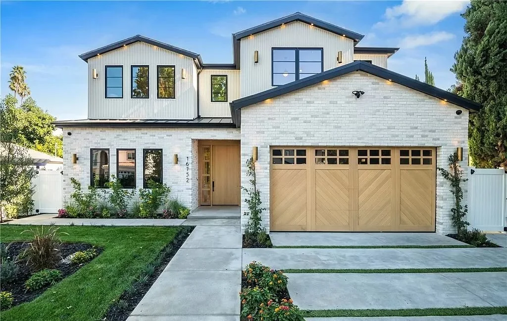 Custom wood carriage style garage door on residential home